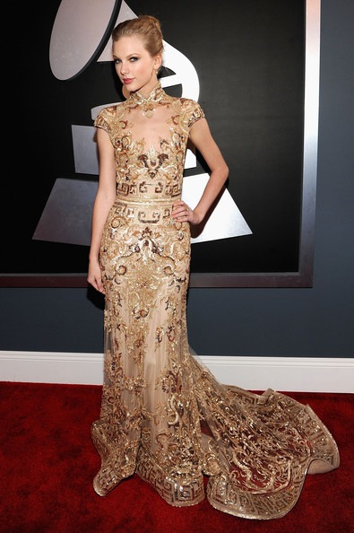 Taylor Swift arrives at the 54th Annual GRAMMY Awards