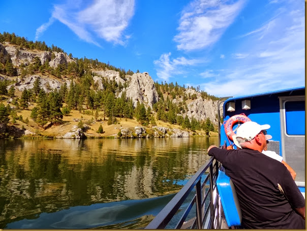 Heading upriver toward the gates aboard The Canyon Voyager boat view of cliffs