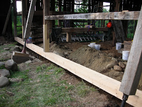 New sills were placed before jacking to the finish height.