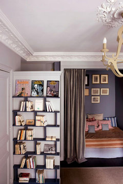 For those living in small apartments, this is a phenomenal way to create an entryway where there is none. Build a wall with shelves as pictured here, or simply put a tall bookshelf parallel to the door to create this look. (apartmenttherapy.com) For those living in small apartments, this is a phenomenal way to create an entryway where there is none. Build a wall with shelves as pictured here, or simply put a tall bookshelf parallel to the door to create this look. (apartmenttherapy.com)