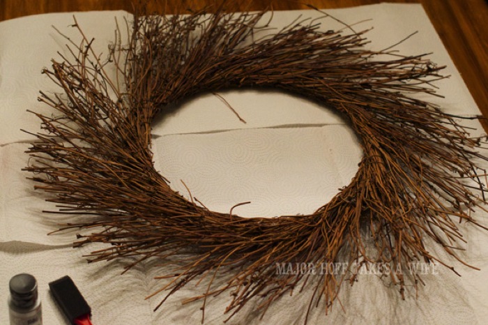 Find wreaths at thrift stores and garage sales. World Market inspired wreath. A fun twist on a Christmas wreath. Make a winter wreath that will last all season long and well past. This cute grapevine wreath is adorned with a tiny bird, pinecones, greenery and pom poms. You won't believe how cheap and easy this was to make! And so simple! #Christmas #winter #holiday #wreath #nature #knockoff Find wreaths at thrift stores and garage sales. World Market inspired wreath. A fun twist on a Christmas wreath. Make a winter wreath that will last all season long and well past. This cute grapevine wreath is adorned with a tiny bird, pinecones, greenery and pom poms. You won't believe how cheap and easy this was to make! And so simple! #Christmas #winter #holiday #wreath #nature #knockoff