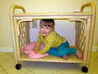 Playing in the kitchen cart at the condo