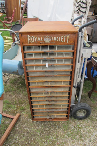 This case held embroidery thread spools at one point.