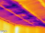 Lack of insulation in a cathedral roof space.