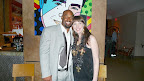 The dining room was packed with plenty of Saints fans and a few athletes in town for the big game. Although the Who Dat Nation decked me out in lots of Saints beads during dinner, my hometown quarterback Donovan McNabb of the Philadelphia Eagles was still nice enough to pose for a photo with me. That's a painting of Chef Emeril behind us.