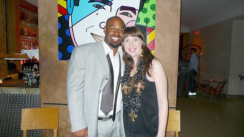 The dining room was packed with plenty of Saints fans and a few athletes in town for the big game. Although the Who Dat Nation decked me out in lots of Saints beads during dinner, my hometown quarterback Donovan McNabb of the Philadelphia Eagles was still nice enough to pose for a photo with me. That's a painting of Chef Emeril behind us.