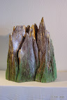 087 - Monts et Merveilles - 1998<br />
H 55 x 50<br />
Sculpture bois doré