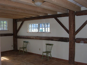 The floor joists support a pottery studio and kiln on the second story.