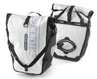 Ortlieb bags will keep all the stuff you need to carry bone-dry as well. They're the best.