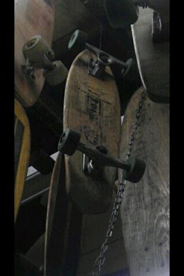 Some old boards sitting in a storage location