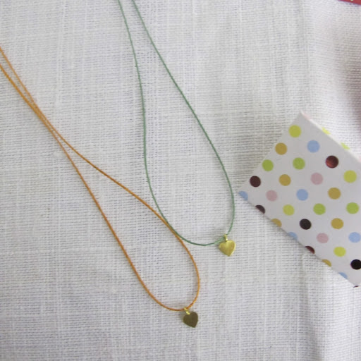 These sweet necklaces are made by Hannah.