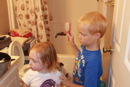 sean and sara brushing hair