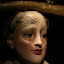 A close up of what looks like ants exiting her head. Dali always was a bit strange...