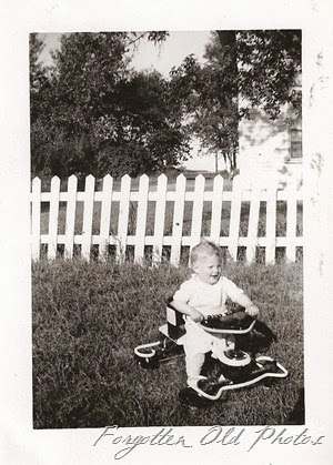 Baby in walker DL Antiques snapshot