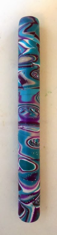 [pen%2520in%2520turquoise%2520and%2520purple%255B4%255D.jpg]