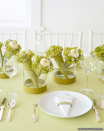 Do double duty by creating centerpieces that guests can also take home as favors after the shower. (marthastewartweddings.com)