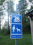 Even though pooches were not permitted to swim in this lake, they could still take their humans there for a roll in the sand.