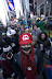 In this photo distributed by Nintendo of America, Arsin C. from Corona, N.Y., poses in front of “Mario’s World” in Times Square, a launch event celebrating the kick off of Super Mario 3D Land, available on Nov. 13, 2011 for Nintendo 3DS.