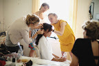 Though Leslie did her own makeup, she relied on three girlfriends to help create her wedding-day hairstyle.