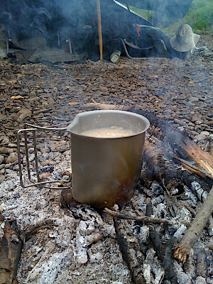 Porridge cooking in the Crusader mug... straight on the fire.