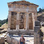 Barbara in front of the Athenian Treasury at Delphi.