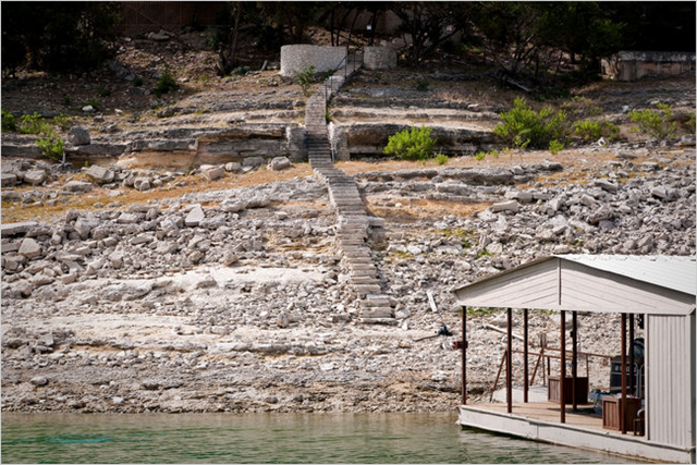 On the cliffs surrounding Lake Buchanan in Central Texas, a white ring extends some 13 feet above the shoreline, marking where the water reaches when the lake is full. At nearby Lake Travis, staircases that once led to the water&rsquo;s edge now end well above it. 19 June 2011 / Todd Wiseman for The Texas Tribune