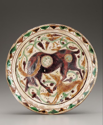 Plate | Origin:  Iran | Period: 10th-11th century | Details:  Not Available | Type: Glazed clay | Size: H: 8.2  W: 34.6  cm | Museum Code: F1927.2 | Photograph and description taken from Freer and the Sackler (Smithsonian) Museums.