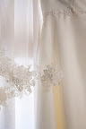 The delicate lace that bordered the veil. The delicate lace that bordered the veil.