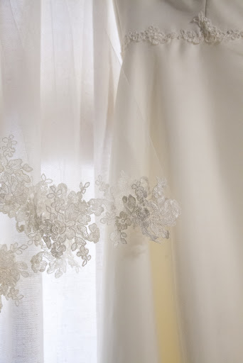 The delicate lace that bordered the veil. The delicate lace that bordered the veil.