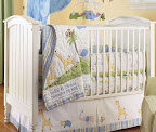Cake was made to match Pottery barn's Jungle friends nursery bedding