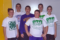 Shelbi Sieren, Eric Hammes, Kyle Bermal, Tim Messenger, Stacie Sieren, and Brandi Sieren, all from the Keota area, were teamed up in 2003 for a 4-H Volleyball event at Mid-Prairie.  Tim Messenger was a member of the 76 Progressives and Riverside Ramblers during his nine years in 4-H from 2000-2009.  He said, “My favorite 4-H memory was in my third year. I bought two cattle and showed them at the fair. I won Reserve Champion Simmental Steer and the other steer was Reserve Champion Lightweight market steer.”  Messenger now is a student at ISU.  Photo Courtesy:  Washington County Extension.