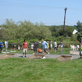 Playing horseshoes Playing horseshoes