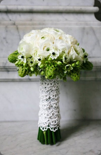 greenwhitecenterpiece7  white ranunculas collared by green arabicum  JL Designs