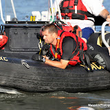 Tuesday evening, DART Team members conducted a training exercise in the Sacramento River at the Broderick Boat Ramp in West Sacramento. The team trained on manual dexterity by diving down and working with commonly found entanglements under water. They also worked on rope signals which is their sole source of communicating between diver and land. DART (Drowning Accident Rescue Team) is a non-profit organization. Divers and team members are volonteers. Visit their site at http://dartsac.org/ News_120710_DARTTraining