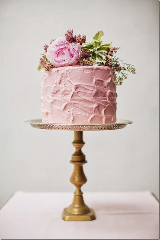 Spring’s It Color. that yummy looking pink cake pops beautifully against that brass cake stand