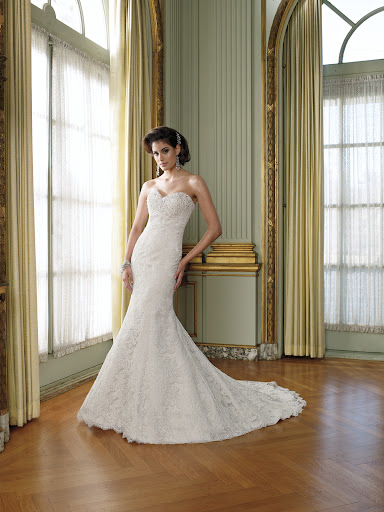 Lovely crystal embellishment and lace on this David Tutera gown. Lovely crystal embellishment and lace on this David Tutera gown.