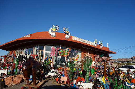 Hacienda Interiors was brimming with color. Bright metal sculptures like these add such vibrance to a desert landscape.