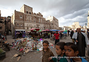 The garbage collectors and street cleaners have been on strike for over two weeks in Sana’a in the midst of the raining season. At Souq Assabah in the old city, piles of wet trash have taken over vegetables in volume and smell.