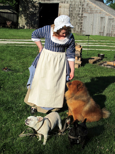 Excuse me, kind maiden!  You see, we are quite confused.  Why are all of you dressed in such odd outfits?