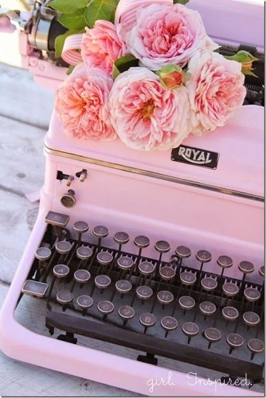 Spring’s It Color. Pretty pink flowers and vintage pink tyypewriter