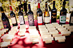 Dinner tables were categorized by wine bottle. Geri's relatives from New Jersey sat the the Jersey Red table; Zach's college buddies were seated at the 47 Friends table. Dinner tables were categorized by wine bottle. Geri's relatives from New Jersey sat the the Jersey Red table; Zach's college buddies were seated at the 47 Friends table.