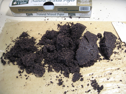 Dates, walnuts, and cocoa processed till it clings well when pressed. Much better. Note the waxed paper I dumped the mixture on; it's key. Dates, walnuts, and cocoa processed till it clings well when pressed. Much better. Note the waxed paper I dumped the mixture on; it's key.