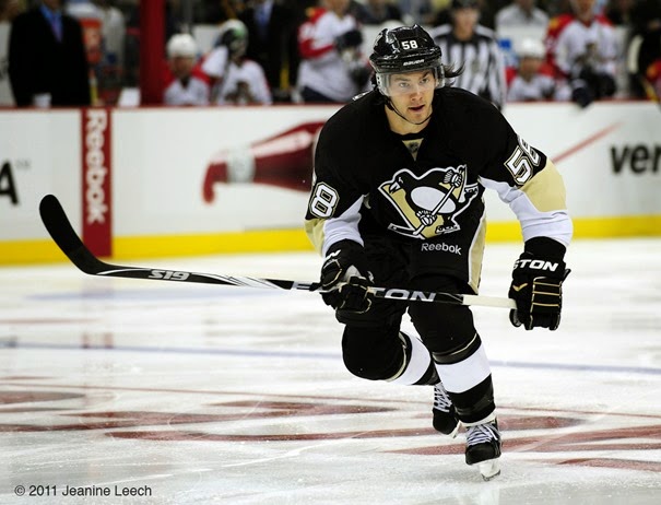 11 October 2011: Pittsburgh Penguins defenseman Kris Letang (58)  skates up ice during the third period in the Pittsburgh Penguins 4-2 win against the Florida Panthers at the Consol Energy Center in Pittsburgh, Pennsylvania.