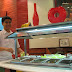 Hubby mixing his own version of a salad at Pizza Hut