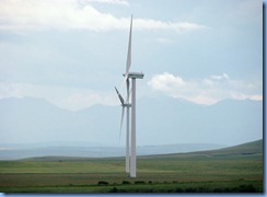 1184 Alberta - gravel roads between Head-Smashed-In Buffalo Jump Interpretive Centre and Pincher Creek - wind turbines   mountains in background