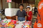 Boys selling (and eating!) candy