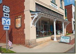 building front with road signs