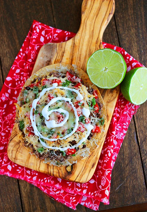 Baked Mexican Tostadas – Pile tasty toppings on these lighter Mexican tostadas with chicken, black beans and red peppers! | thecomfortofcooking.com
