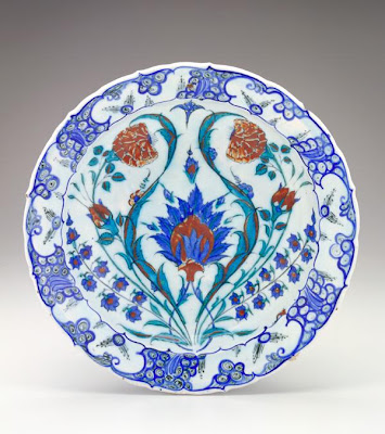Plate | Origin:  Turkey | Period: 1570-75  Ottoman period | Details:  Not Available | Type: Stone-paste body painted under glaze | Size: H: 6.4  W: 31.7  cm | Museum Code: F1969.25 | Photograph and description taken from Freer and the Sackler (Smithsonian) Museums.