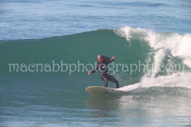 Kim on a backside turn at Swamis looking stylish!